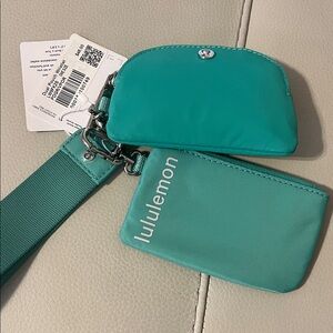 lululemon athletica Teal Clutch and Wristlet Set
